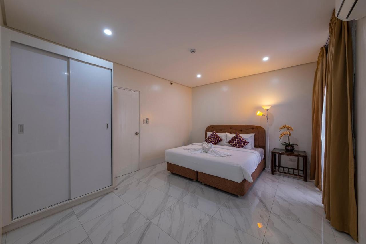 Cebu Family Suites Powered By Cocotel Екстер'єр фото